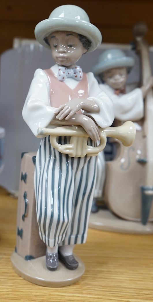 A Lladro group of six ‘Jazz Band’ figures, tallest 25cm. Condition - good